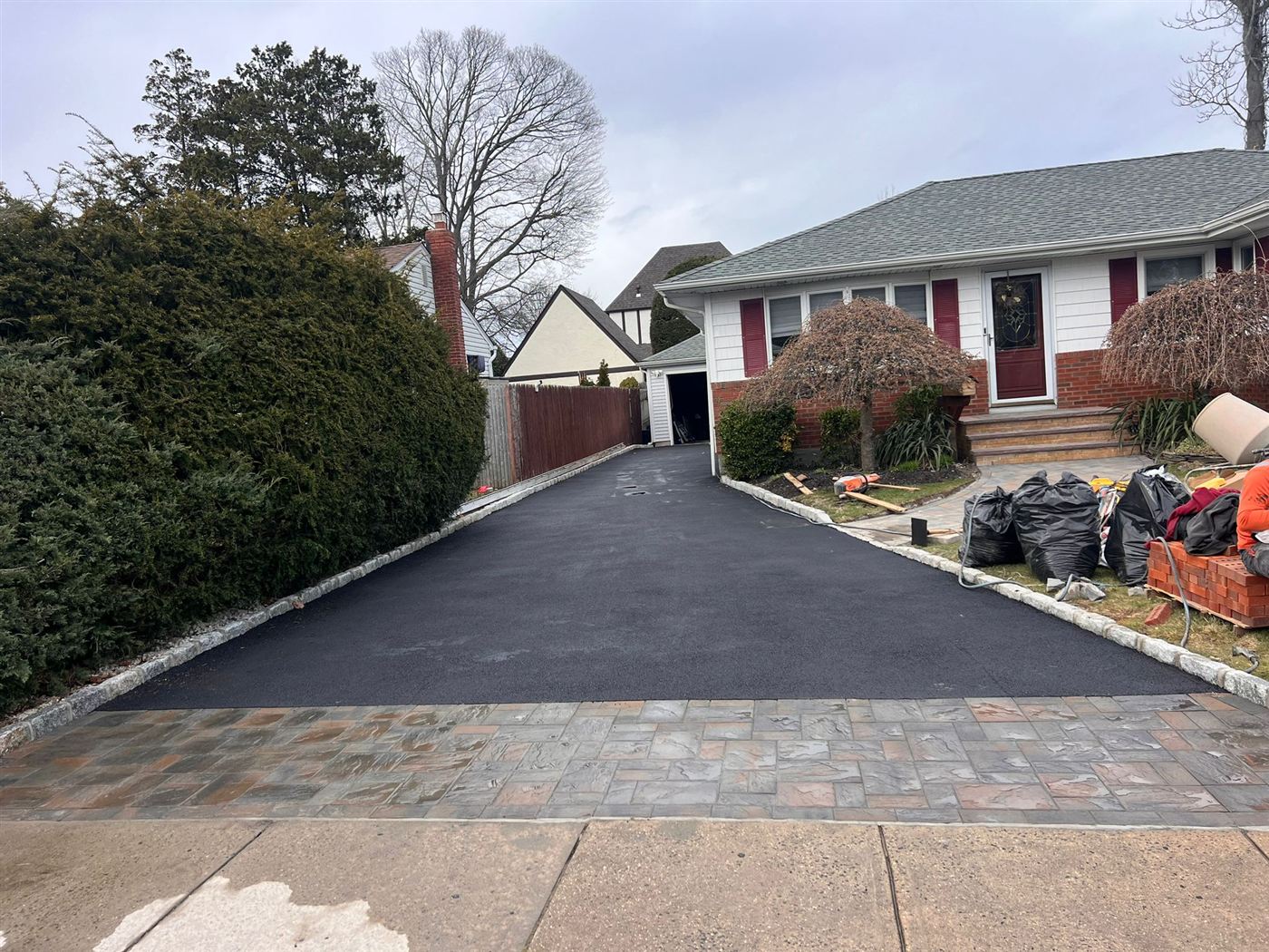 Newly installed residential asphalt driveway